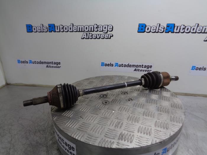 Front drive shaft, left from a Volkswagen Up! (121) 1.0 12V 75 2014