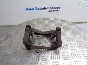Used Front brake calliperholder, right Renault Twingo II (CN) 1.2 16V Price on request offered by Boels Autodemontage