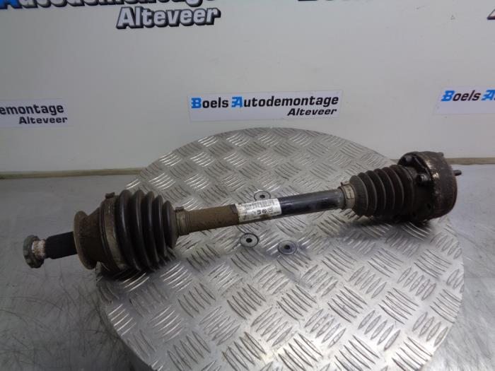 Front drive shaft, left from a Volkswagen Polo V (6R) 1.2 12V 2011
