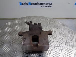 Used Front brake calliper, right Daihatsu Cuore (L251/271/276) 1.0 12V DVVT Price € 35,00 Margin scheme offered by Boels Autodemontage