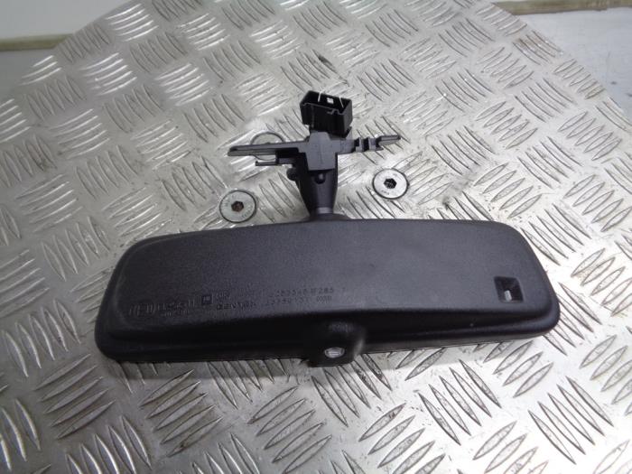 Rear view mirror from a Opel Corsa D 1.2 16V 2011