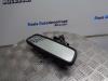 Rear view mirror from a Opel Corsa D 1.2 16V 2011