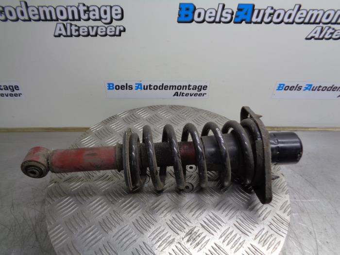 Rear shock absorber rod, left from a Volkswagen Passat Variant 4Motion (3B6) 2.8 V6 30V 2001