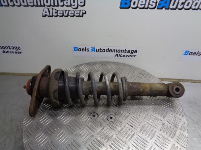 Rear shock absorber, left from a MINI Mini One/Cooper (R50) 1.6 16V One 2003