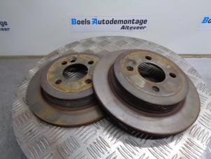 Used Rear brake disc BMW Mini One/Cooper (R50) 1.6 16V One Price € 20,00 Margin scheme offered by Boels Autodemontage