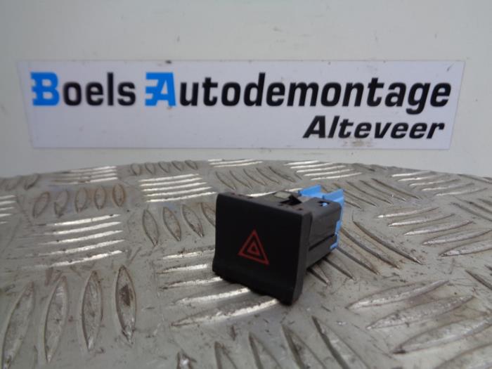 Commutateur éclairage d'urgence d'un Volkswagen Polo V (6R) 1.4 TDI DPF BlueMotion technology 2015