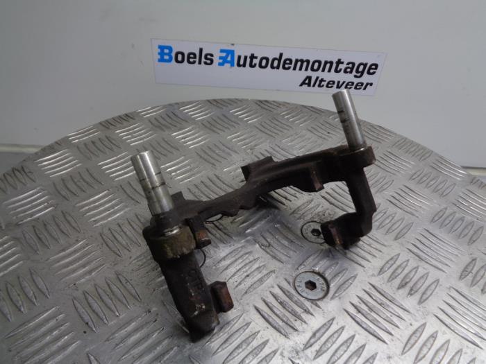 Rear brake calliperholder, left from a Volkswagen Passat Variant (3G5) 2.0 TDI BiTurbo 16V 4Motion 2017