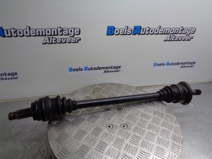 Drive shaft, rear right from a BMW 5 serie (F10) 518d 16V 2014