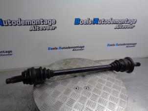Used Drive shaft, rear right BMW 5 serie (F10) 518d 16V Price € 50,00 Margin scheme offered by Boels Autodemontage