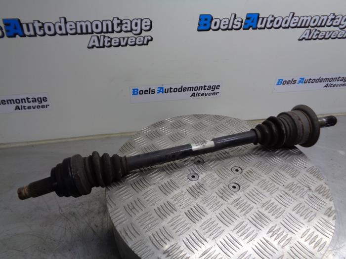 Drive shaft, rear left from a BMW 5 serie (F10) 518d 16V 2014