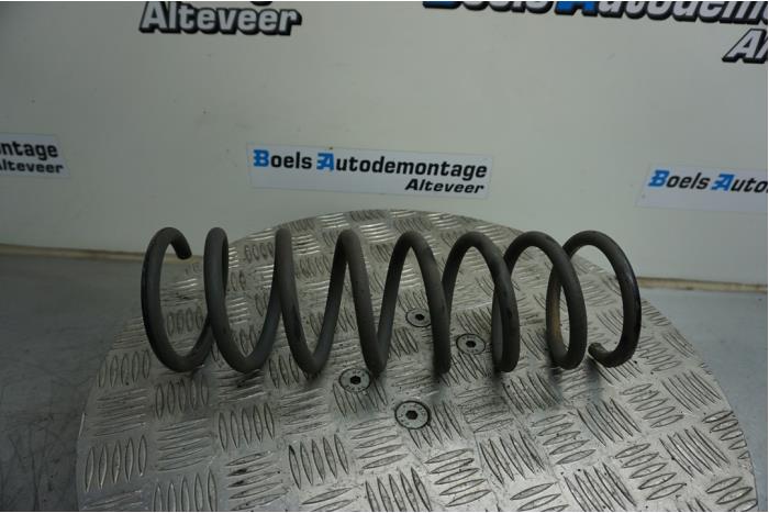 Rear coil spring from a Volvo V40 (MV) 2.0 D2 16V 2015