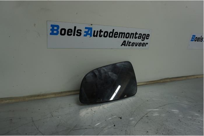 Mirror glass, left from a Opel Astra H (L48) 1.4 16V Twinport 2007