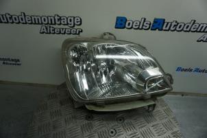 Used Headlight, right Daihatsu Cuore (L251/271/276) 1.0 12V DVVT Price € 35,00 Margin scheme offered by Boels Autodemontage