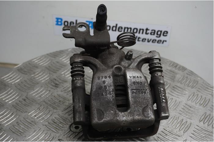 Rear brake calliper, left from a Volkswagen Caddy IV 2.0 TDI 102 2016