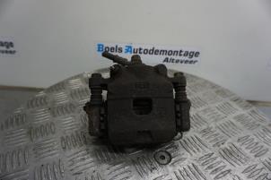 Used Front brake calliper, right Daihatsu Cuore (L251/271/276) 1.0 12V DVVT Price € 35,00 Margin scheme offered by Boels Autodemontage