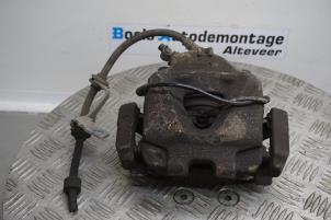 Used Front brake calliper, left BMW 3 serie Touring (E91) 318d 16V Price € 40,00 Margin scheme offered by Boels Autodemontage