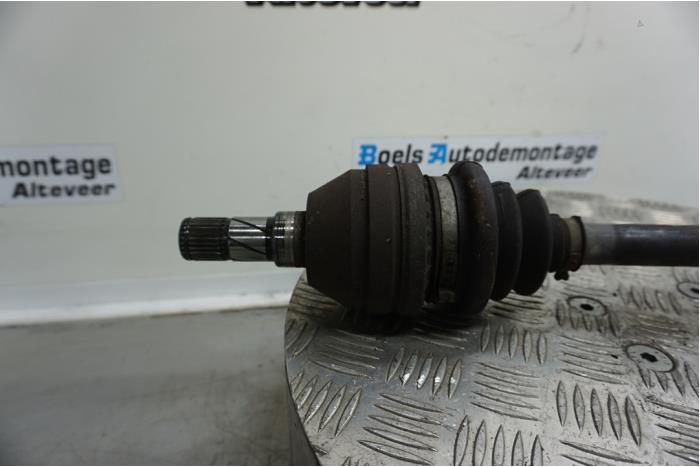 Front drive shaft, left from a Opel Astra J Sports Tourer (PD8/PE8/PF8) 1.4 Turbo 16V 2012
