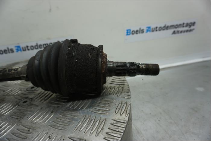 Front drive shaft, left from a Opel Astra J Sports Tourer (PD8/PE8/PF8) 1.4 Turbo 16V 2012