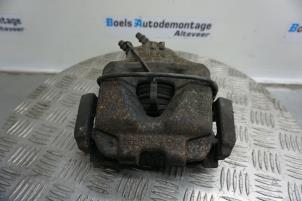 Used Front brake calliper, left BMW 3 serie Touring (E91) 320d 16V Price € 40,00 Margin scheme offered by Boels Autodemontage