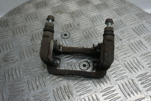 Used Rear brake calliperholder, left Kia Rio III (UB) 1.1 CRDi VGT 12V Price € 15,00 Margin scheme offered by Boels Autodemontage