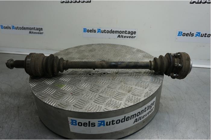 Drive shaft, rear left from a BMW 1 serie (E87/87N) 118i 16V 2006