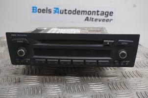 Used Radio CD player BMW 1 serie (E87/87N) 118i 16V Price € 40,00 Margin scheme offered by Boels Autodemontage