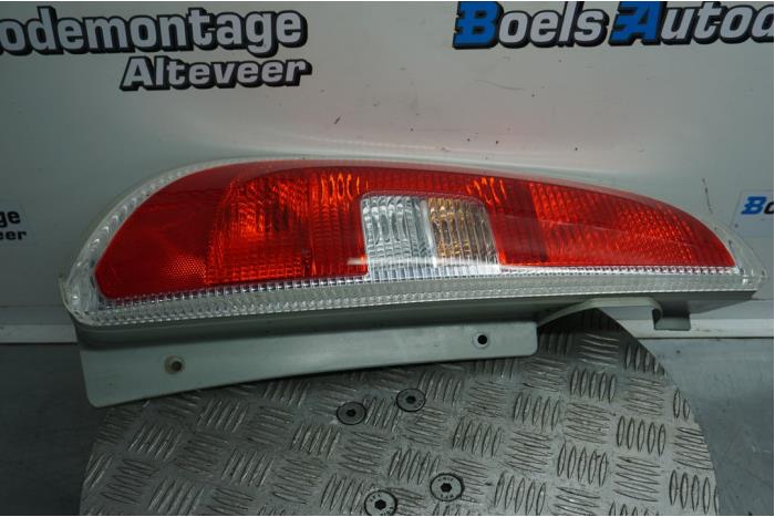 Taillight, left from a Skoda Roomster (5J) 1.2 TSI 2010