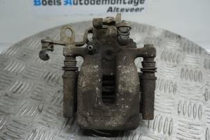 Used Rear brake calliper, left Peugeot Partner (GC/GF/GG/GJ/GK) 1.6 HDI 75 Phase 1 Price € 35,00 Margin scheme offered by Boels Autodemontage