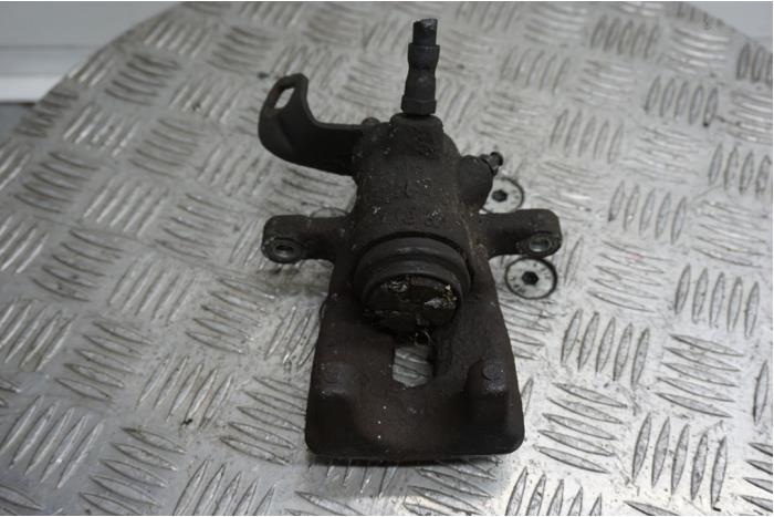 Rear brake calliper, left from a MINI Clubman (R55) 1.6 16V One 2010