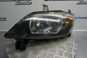 Used Headlight, left Mazda 2 (NB/NC/ND/NE) 1.4 16V Price € 35,00 Margin scheme offered by Boels Autodemontage
