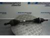 Front drive shaft, left from a Renault Kangoo Express (FW), 2008 1.5 dCi 90 FAP, Delivery, Diesel, 1.461cc, 66kW (90pk), FWD, K9K808; K9KE8, 2009-02, FW0G; FW15 2011