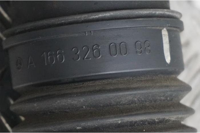 Rear shock absorber, left from a Mercedes-AMG ML III AMG (166) 5.5 ML-63 AMG V8 32V Biturbo 2012