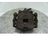 Daihatsu Cuore (L251/271/276) 1.0 12V DVVT Främre bromsok, vänster