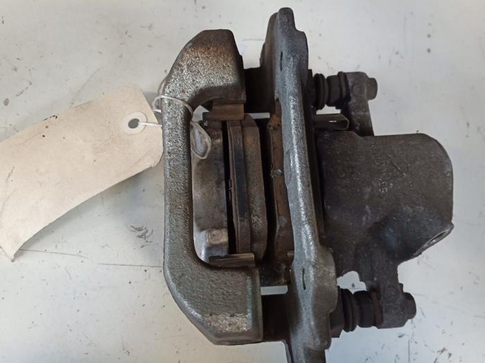 Rear brake calliper, left from a Toyota Verso 1.6 16V VVT-i 2014