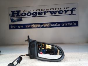 Usados Retrovisor externo derecha Opel Zafira (F75) 1.8 16V Precio € 20,00 Norma de margen ofrecido por Autobedrijf Hoogerwerf