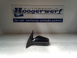 Używane Lusterko zewnetrzne lewe Opel Astra Cena € 30,00 Procedura marży oferowane przez Autobedrijf Hoogerwerf