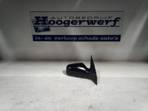 Used Wing mirror, right Opel Astra Price € 30,00 Margin scheme offered by Autobedrijf Hoogerwerf