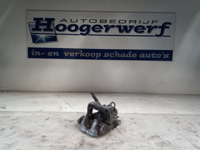 Rear brake calliper, left from a Peugeot 208 I (CA/CC/CK/CL) 1.6 Blue HDi 100 2016