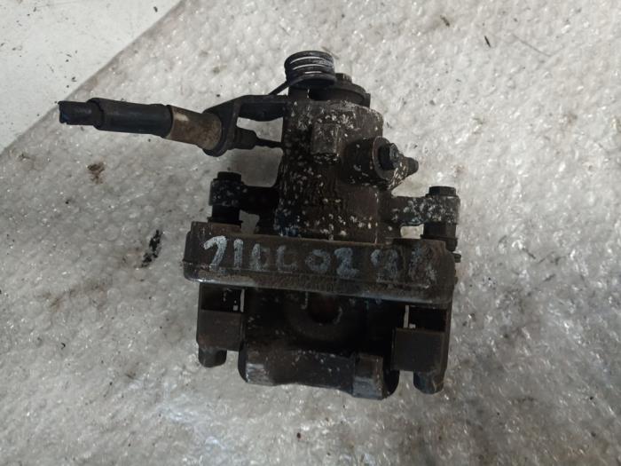 Rear brake calliper, left from a Peugeot 208 I (CA/CC/CK/CL) 1.6 Blue HDi 100 2016