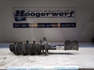 Used Front shock absorber rod, left Opel Corsa D 1.2 16V Price € 30,00 Margin scheme offered by Autobedrijf Hoogerwerf