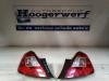Opel Corsa D 1.4 16V Twinport Set of taillights, left + right