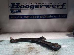 Usagé Bras de suspension avant gauche Nissan Micra (K12) 1.2 16V Prix € 25,00 Règlement à la marge proposé par Autobedrijf Hoogerwerf