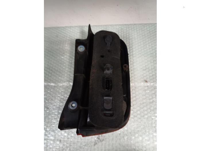 Taillight, left from a Nissan Micra (K12) 1.2 16V 2005