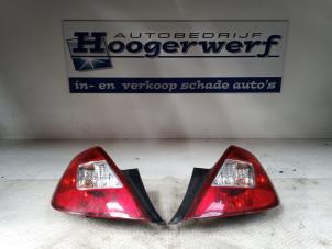 Usagé Feu arrière gauche Opel Corsa D 1.2 16V Prix € 20,00 Règlement à la marge proposé par Autobedrijf Hoogerwerf