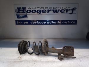 Used Fronts shock absorber, left Nissan Micra (K12) 1.2 16V Price € 30,00 Margin scheme offered by Autobedrijf Hoogerwerf