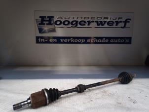 Used Front drive shaft, right Nissan Micra (K12) 1.2 16V Price € 20,00 Margin scheme offered by Autobedrijf Hoogerwerf