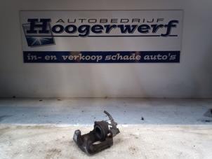 Gebrauchte Bremszange links vorne Volkswagen Up! (121) 1.0 12V 60 Preis € 20,00 Margenregelung angeboten von Autobedrijf Hoogerwerf