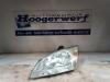 Headlight, left from a Ford Focus 2 2.0 TDCi 16V 2006