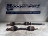 Front drive shaft, left from a Opel Cascada, 2013 / 2019 1.4 Turbo 16V, Convertible, Petrol, 1.364cc, 103kW (140pk), FWD, A14NET, 2013-03 / 2014-12 2014