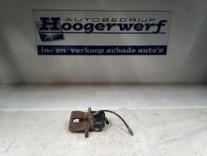 Usagé Etrier de frein (pince) arrière droit Seat Alhambra (7N) 2.0 TDI 16V Prix € 75,00 Règlement à la marge proposé par Autobedrijf Hoogerwerf